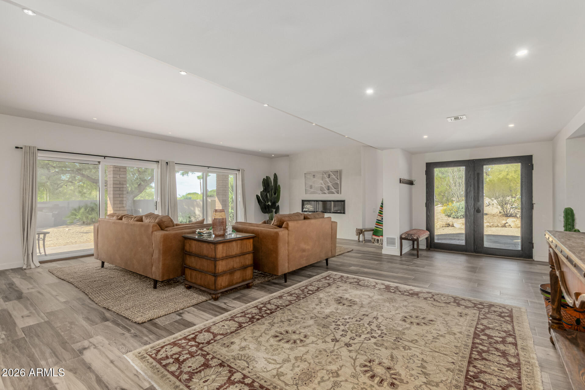 3001 Ironwood Road Carefree, AZ 85377 - Photo 6 of 31 a living room with furniture and large windows