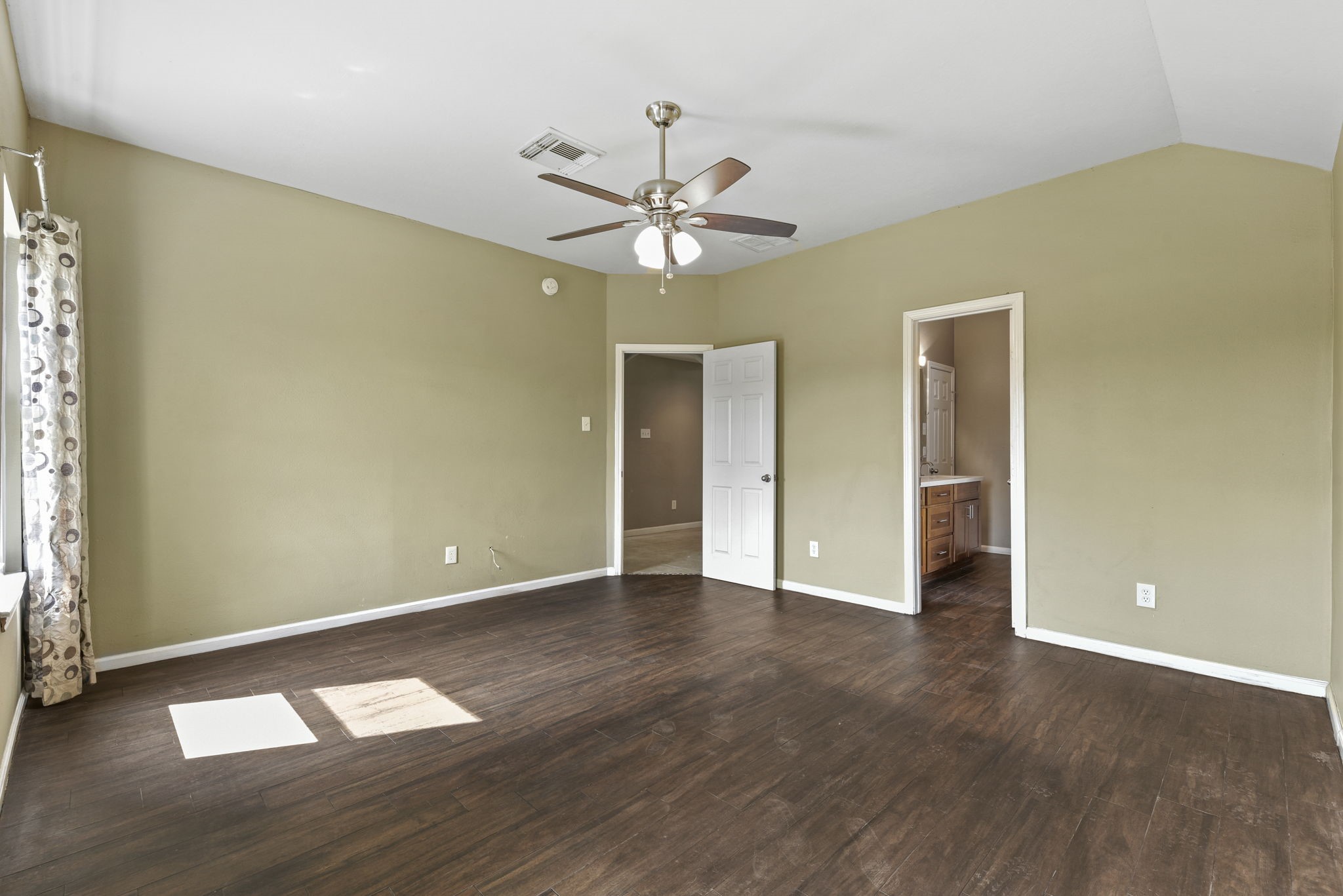 5406 Gate Canyon Court Spring, TX 77373 - Photo 19 of 47 a view of an empty room with window and wooden floor