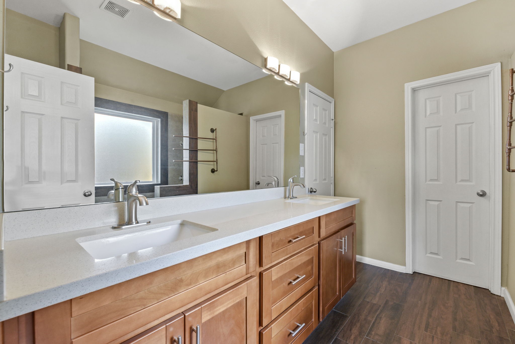 5406 Gate Canyon Court Spring, TX 77373 - Photo 21 of 47 a bathroom with a double vanity sink and a mirror