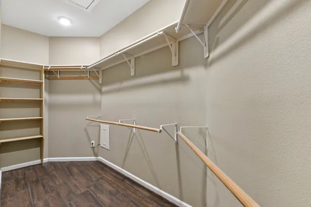 a view of an empty walk in closet