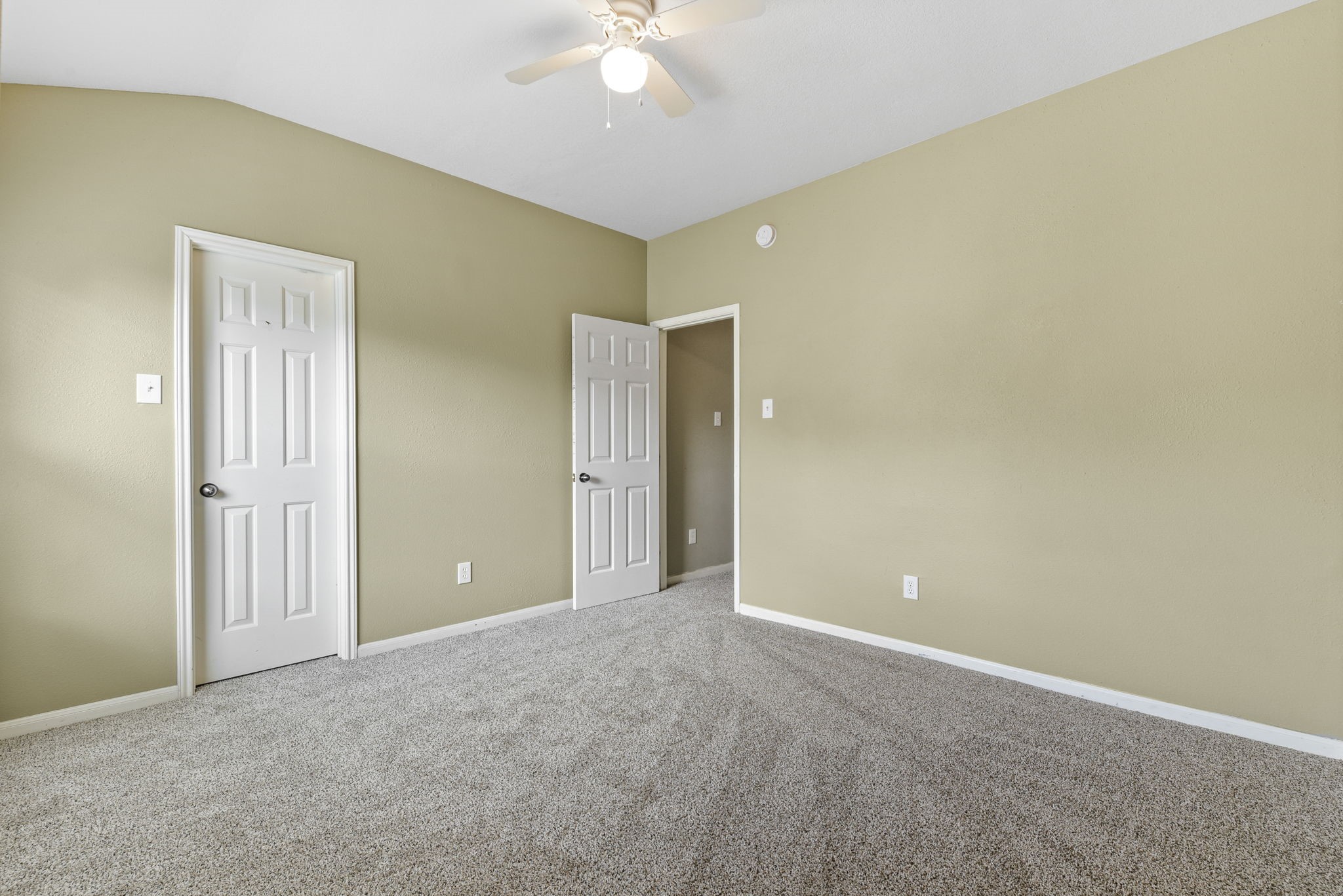 5406 Gate Canyon Court Spring, TX 77373 - Photo 39 of 47 a view of an empty room with a chandelier fan