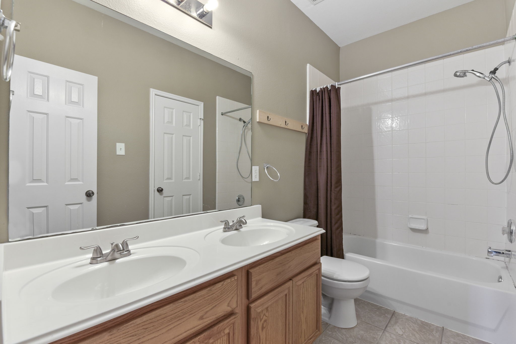 5406 Gate Canyon Court Spring, TX 77373 - Photo 40 of 47 a bathroom with a granite countertop sink toilet and shower