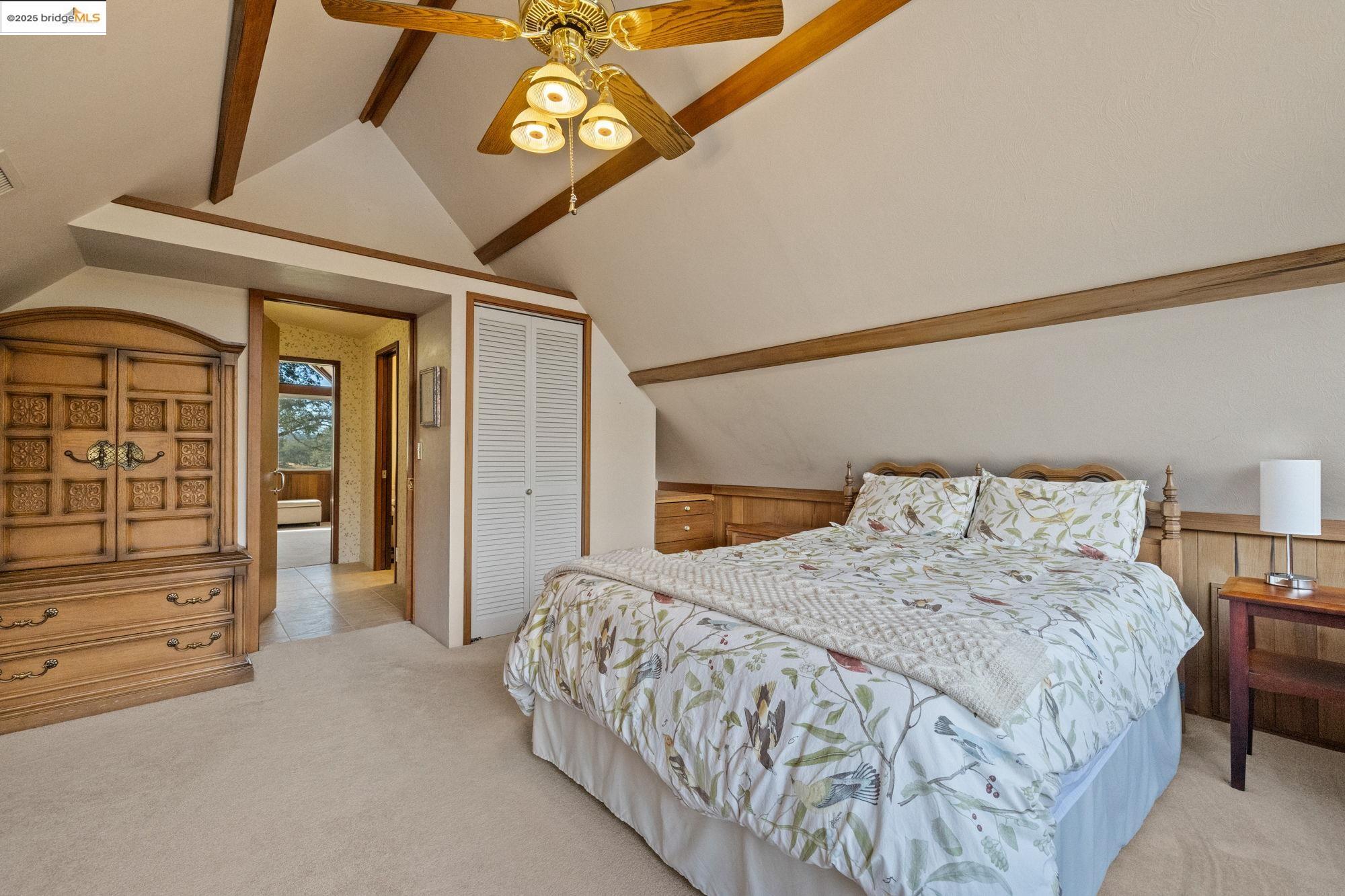 10566 Thistle Down Road Jamestown, CA 95327 - Photo 27 of 53 Bedroom with light carpet, a closet, and ceiling fan