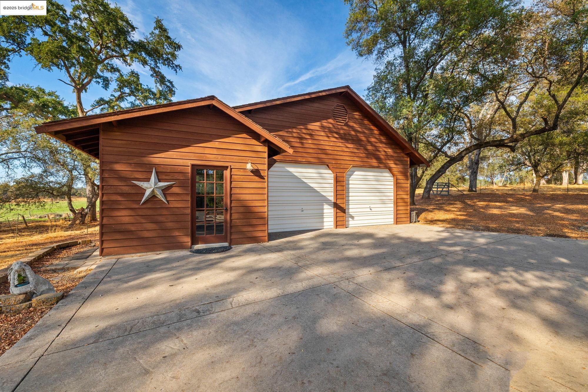 10566 Thistle Down Road Jamestown, CA 95327 - Photo 3 of 53 Garage with driveway