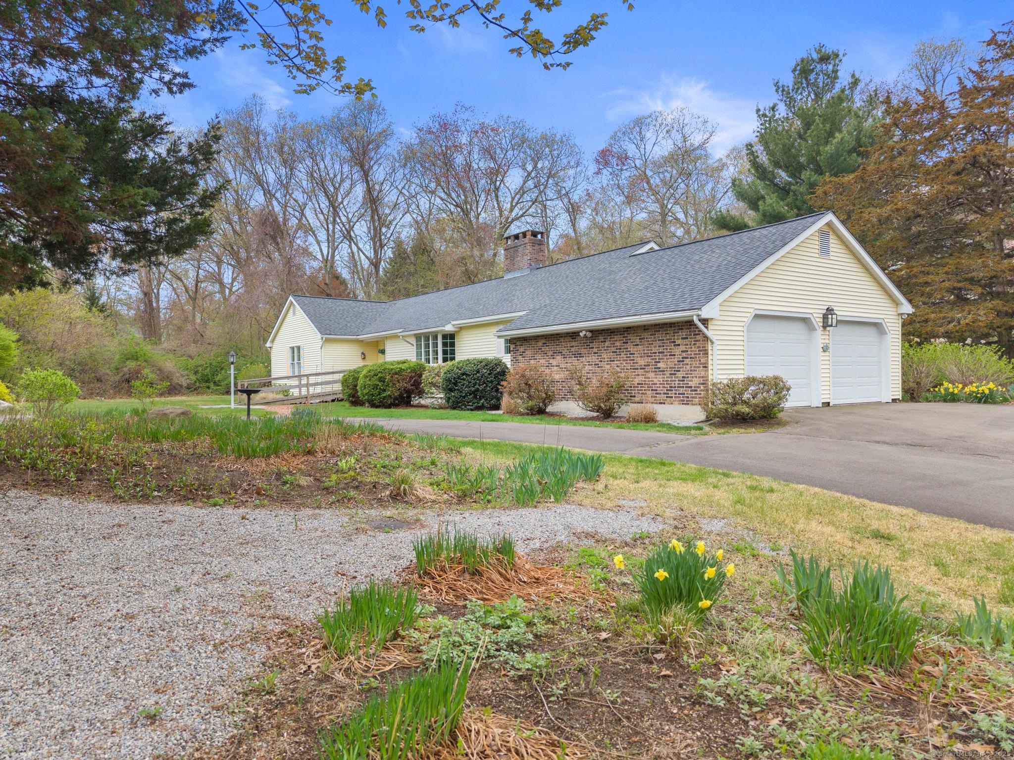 107 Ayers Point Road Old Saybrook, CT 06475 - Photo 1 of 1 a view of a house with backyard and trees