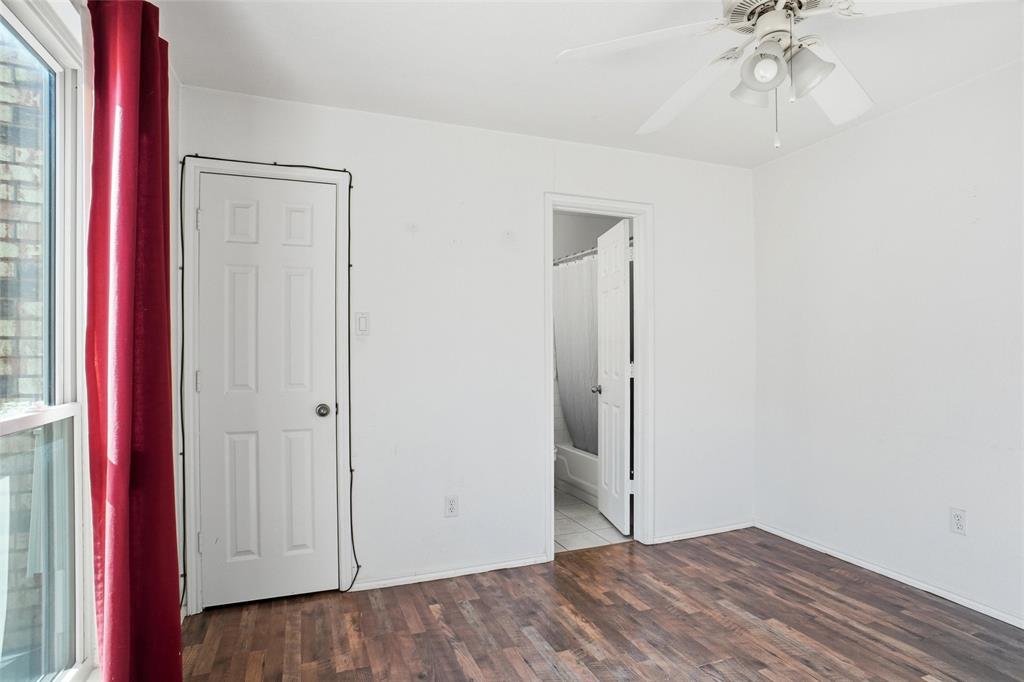 827 West Harwood Road, Unit D Hurst, TX 76054 - Photo 17 of 24 Primary bedroom with walkin closet...