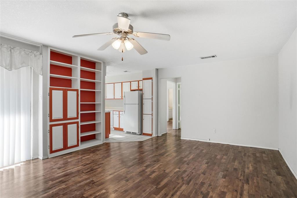 827 West Harwood Road, Unit D Hurst, TX 76054 - Photo 9 of 24 Wood like flooring in living area...