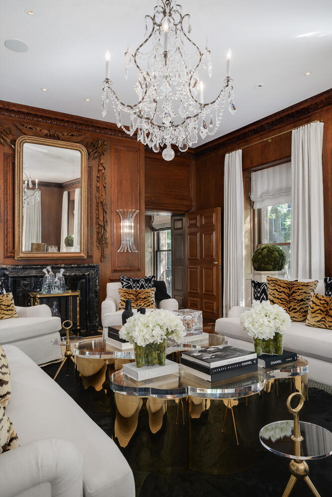 1500 North Astor Street, Unit 6 Chicago, IL 60610 - Photo 14 of 39 a view of a dining room with furniture a chandelier and large windows