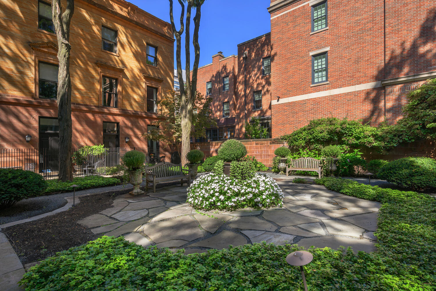 1500 North Astor Street, Unit 6 Chicago, IL 60610 - Photo 35 of 39 a pathway of a house with a yard and a garden