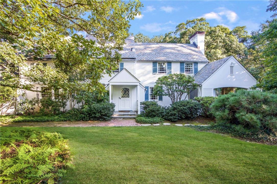 37 Osborn Road Harrison, NY 10528 - Photo 1 of 1 a front view of a house with garden
