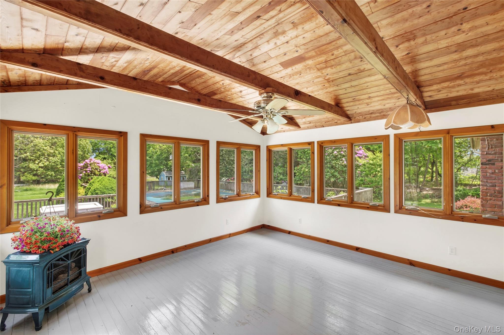 250 Paradise Point Road Southold, NY 11971 - Photo 8 of 24 a view of an empty room with a window