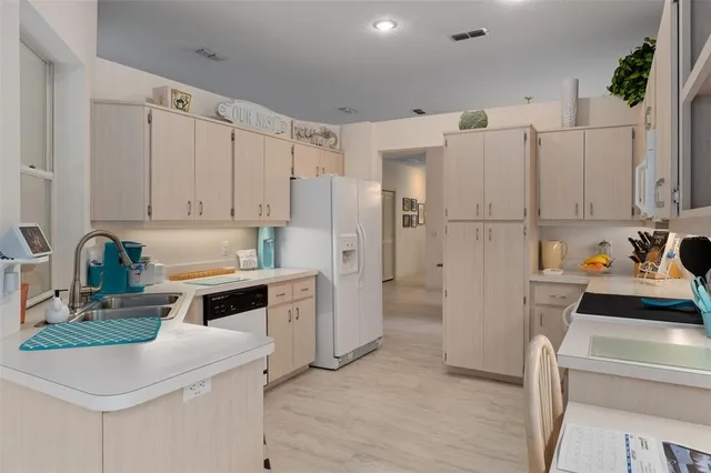 a living room with furniture and a mirror