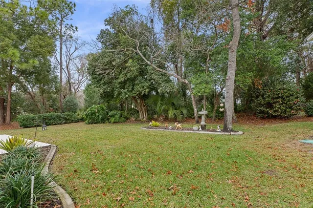 a view of a patio with swimming pool and table
