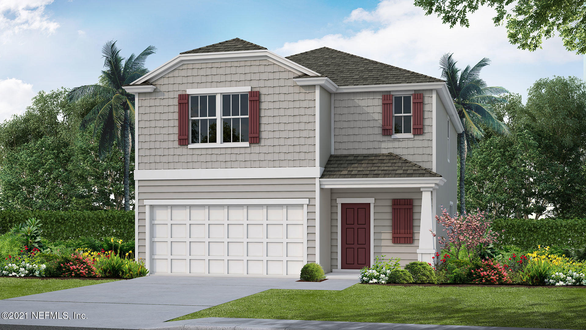 3438 Lawton Road Orlando, FL 32803 - Photo 1 of 10 a front view of a house with a yard and garage