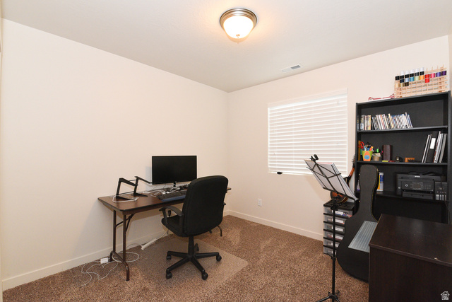 1632 North Apache Road Saratoga Springs, UT 84045 - Photo 22 of 28 Room with neutral wall paint and brown carpet flooring