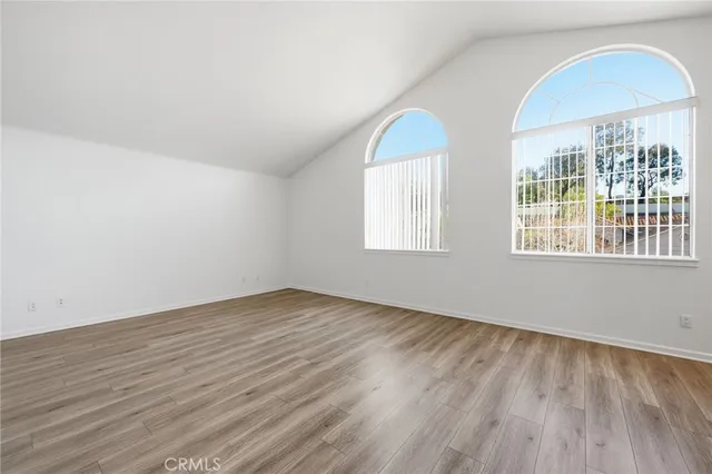 a view of house with yard and garden
