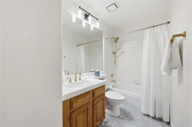 a view of a livingroom with furniture and bench