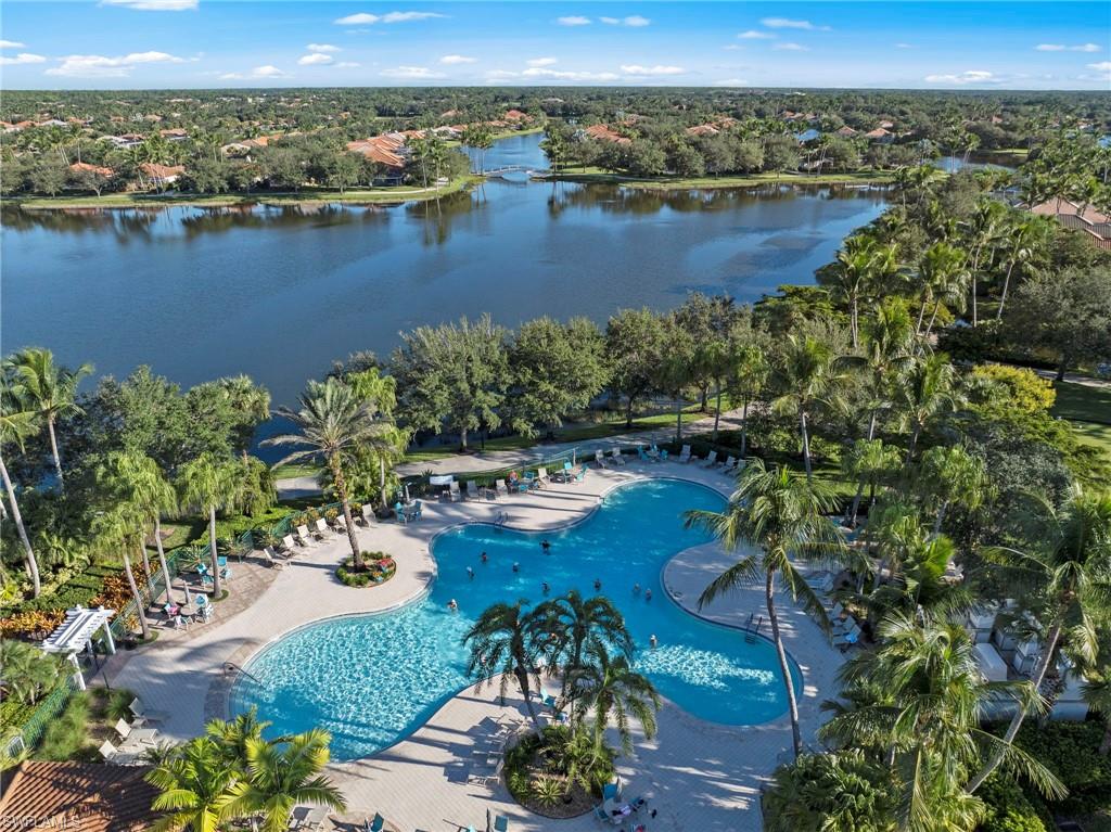 3238 Barbados Lane Naples, FL 34119 - Photo 31 of 43 an aerial view of a houses with a lake view