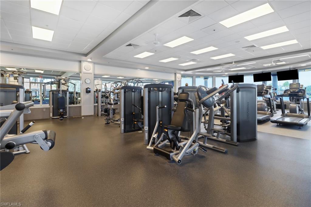 3238 Barbados Lane Naples, FL 34119 - Photo 40 of 43 a view of a room with gym equipment