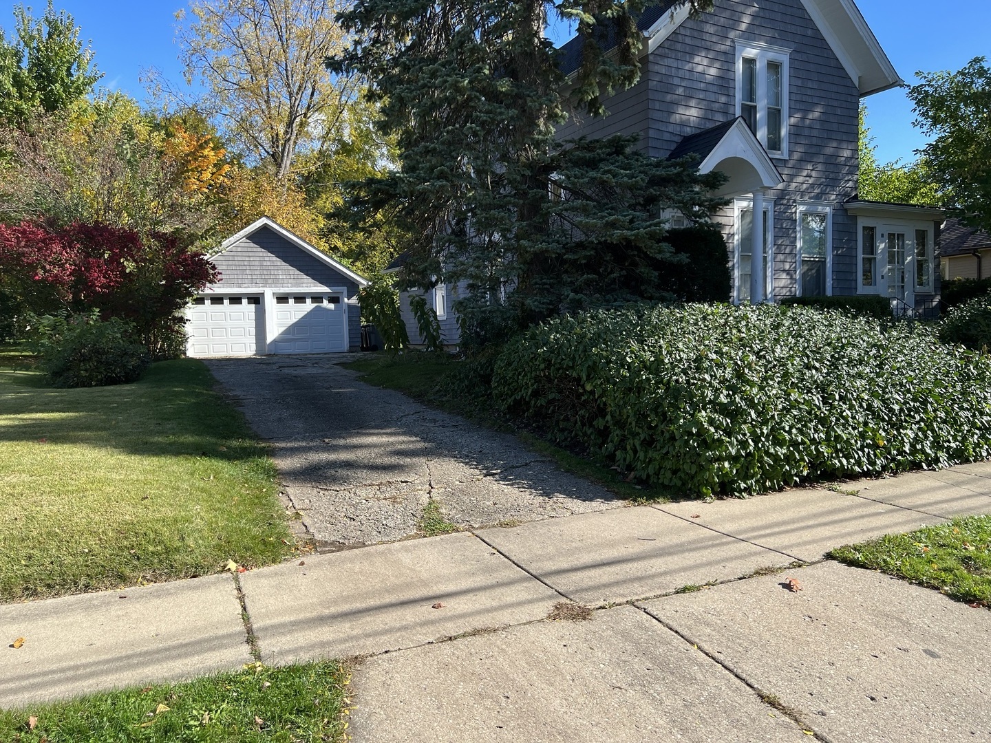 a view of house with yard