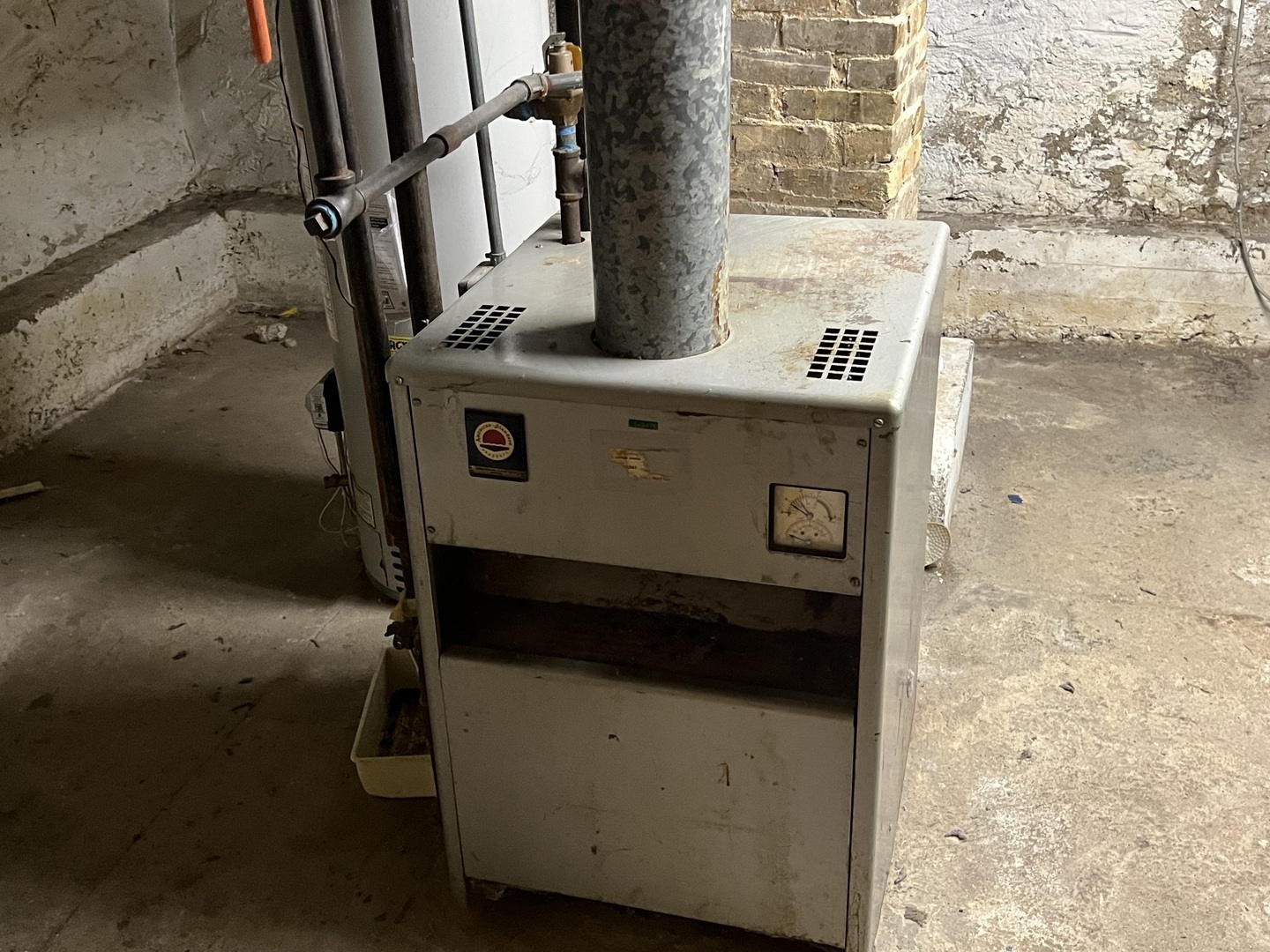 833 Prospect Street Elgin, IL 60120 - Photo 18 of 20 a close view of water heater