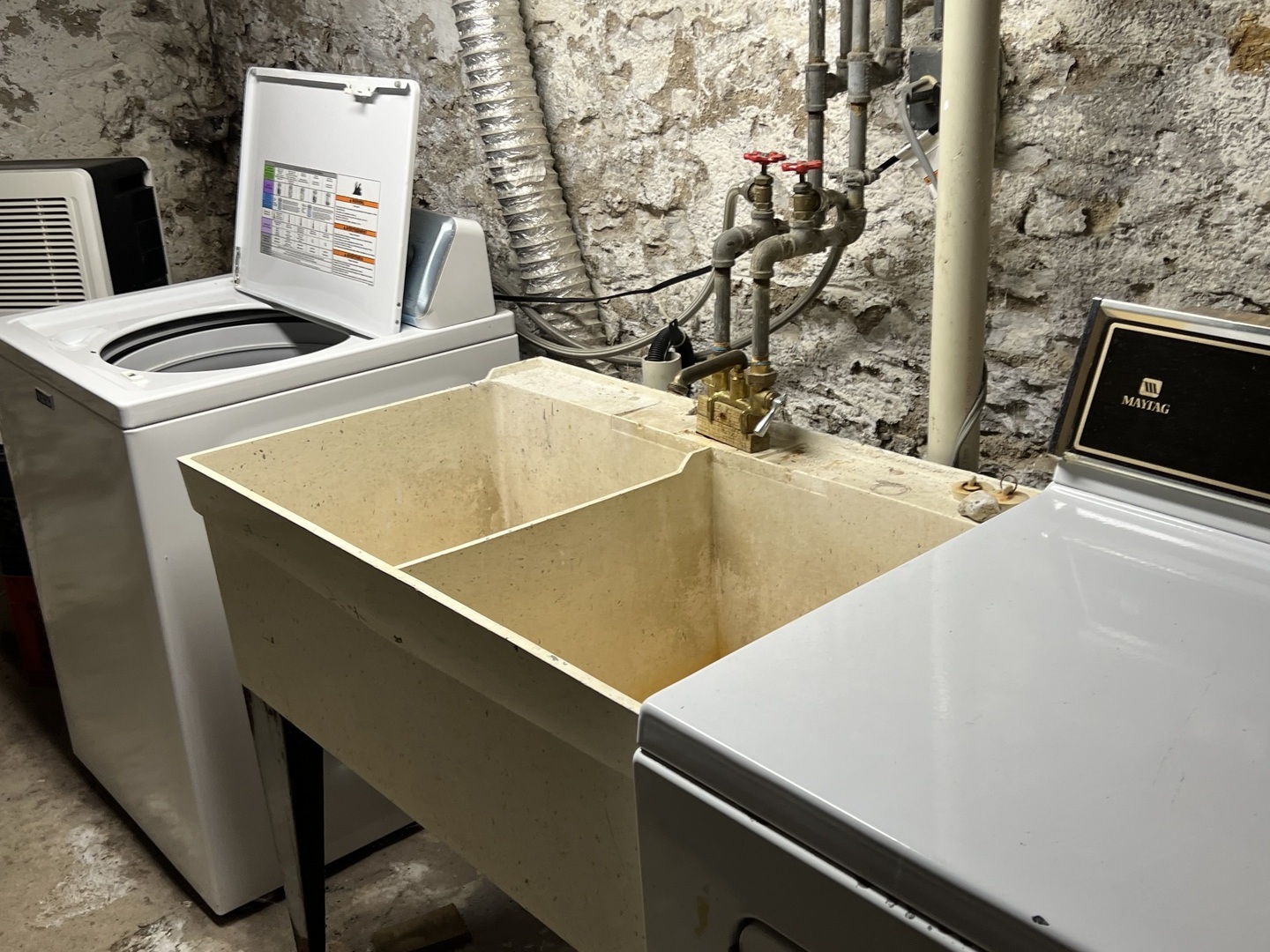 833 Prospect Street Elgin, IL 60120 - Photo 20 of 20 a close up view of a sink with washer and dryer