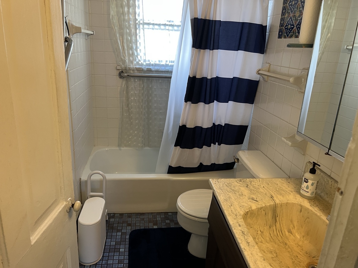 833 Prospect Street Elgin, IL 60120 - Photo 10 of 20 a bathroom with a sink toilet and shower