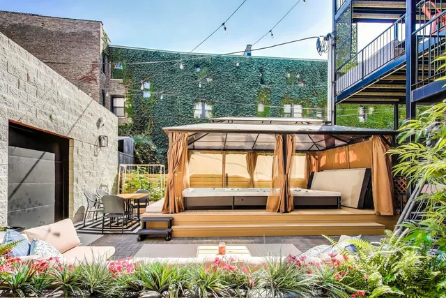 a outdoor living space with patio furniture and a potted plant