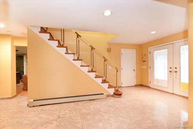 a view of entryway with wooden floor
