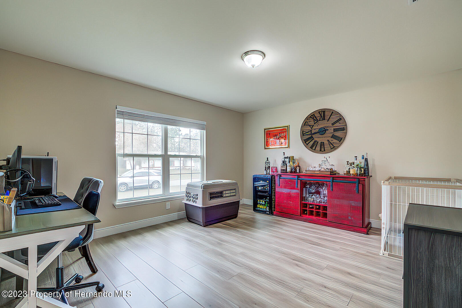 8140 Jasbow Junction Weeki Wachee, FL 34613 - Photo 13 of 37 a view of a workspace with furniture and a window