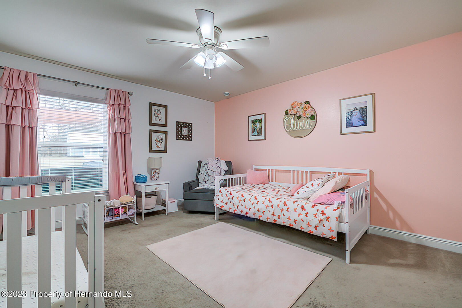 8140 Jasbow Junction Weeki Wachee, FL 34613 - Photo 19 of 37 a bedroom with furniture and a large window