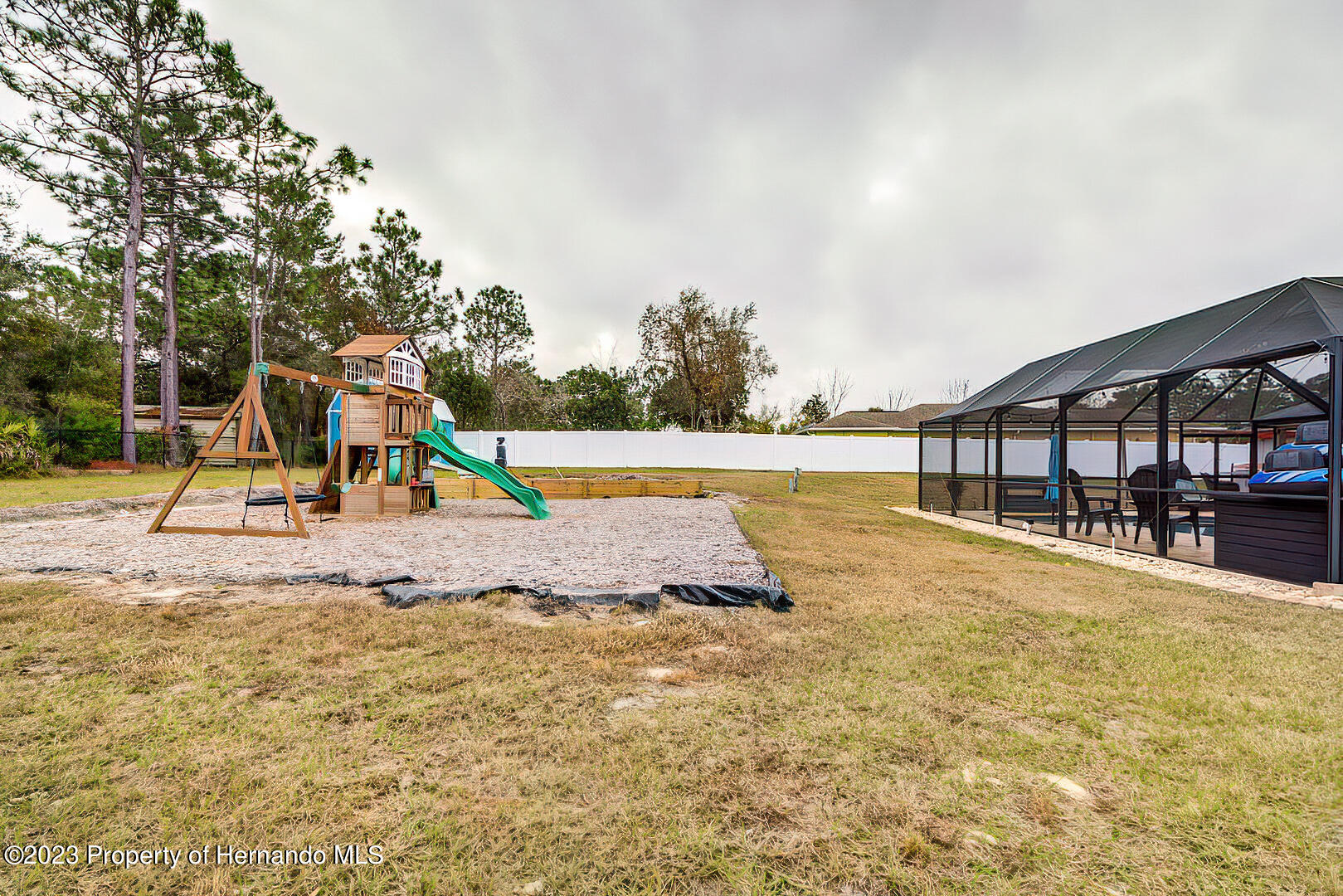 8140 Jasbow Junction Weeki Wachee, FL 34613 - Photo 37 of 37 a view of a swimming pool with a slide