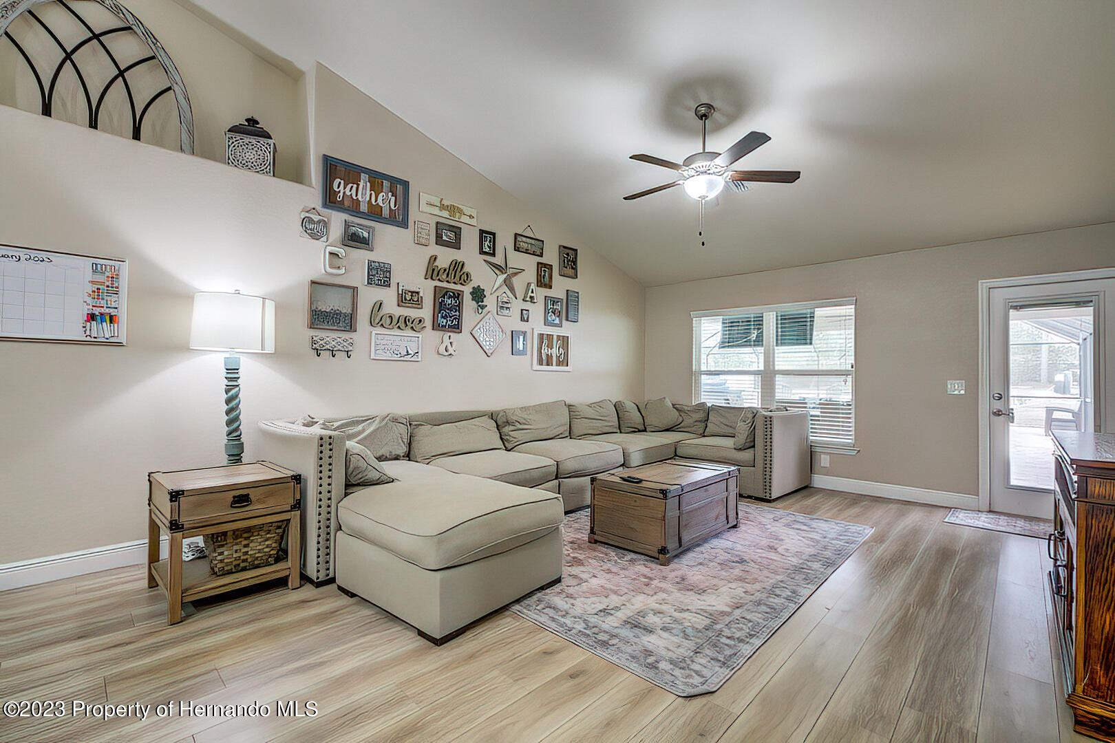 8140 Jasbow Junction Weeki Wachee, FL 34613 - Photo 5 of 37 a living room with furniture and a window