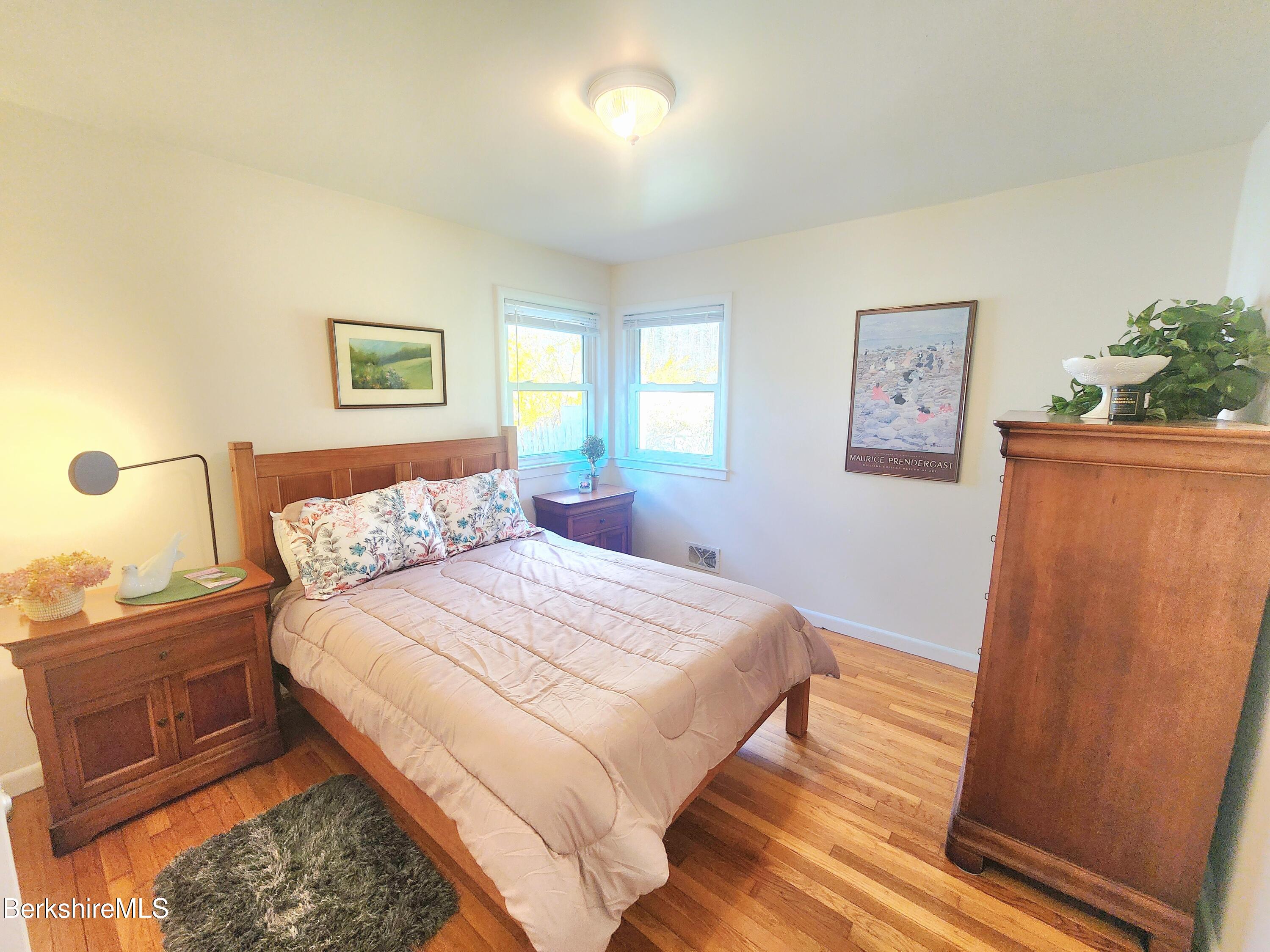 16 East New Lenox Road Lenox, MA 01240 - Photo 14 of 31 a bedroom with a bed and a window
