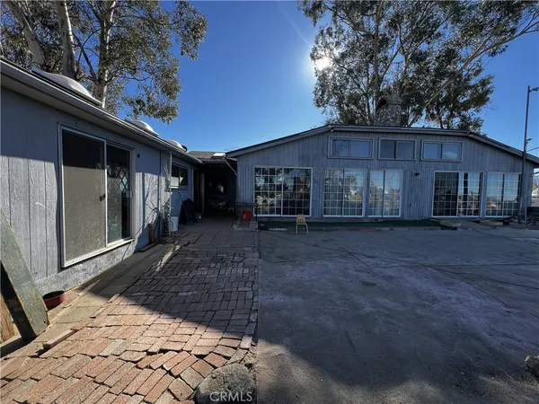a view of a house with a patio