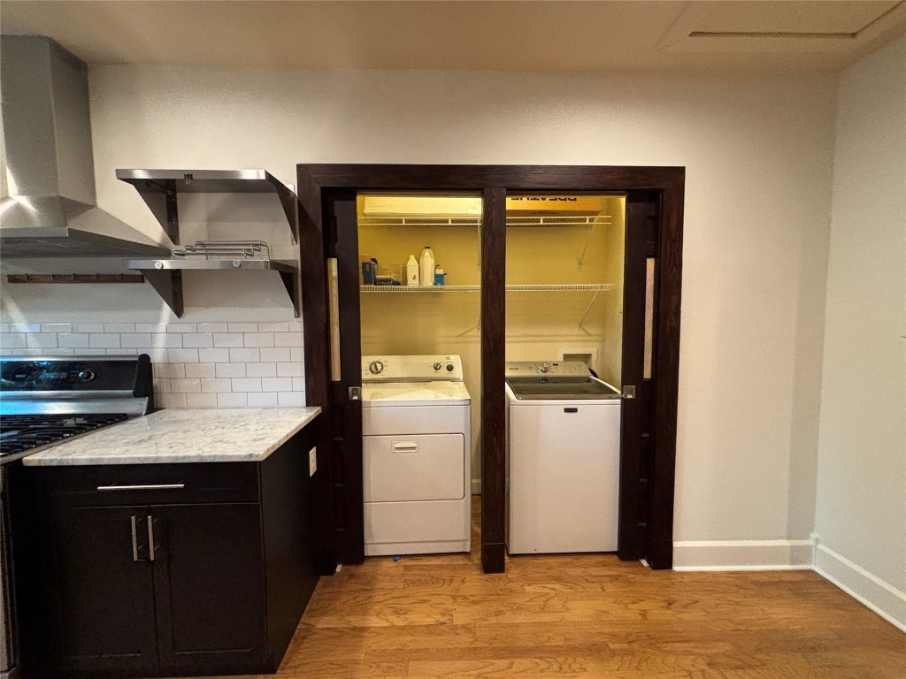 5808 Coventry Lane Austin, TX 78723 - Photo 16 of 27 a kitchen with a refrigerator and a sink