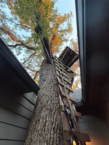 a view of balcony with wooden floor