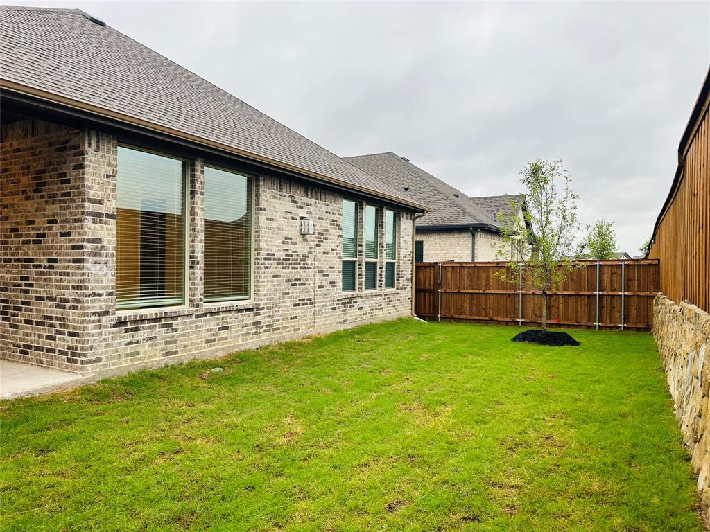 1605 Hart Drive Mansfield, TX 76063 - Photo 21 of 21 a view of backyard with garden