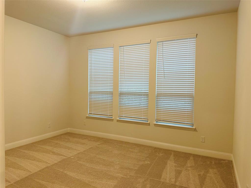 1605 Hart Drive Mansfield, TX 76063 - Photo 9 of 21 a view of an empty room with a window