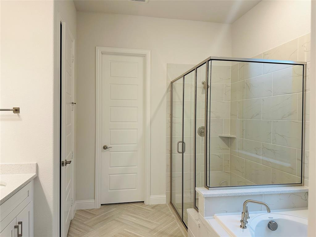 1605 Hart Drive Mansfield, TX 76063 - Photo 10 of 21 a bathroom with a shower and a sink