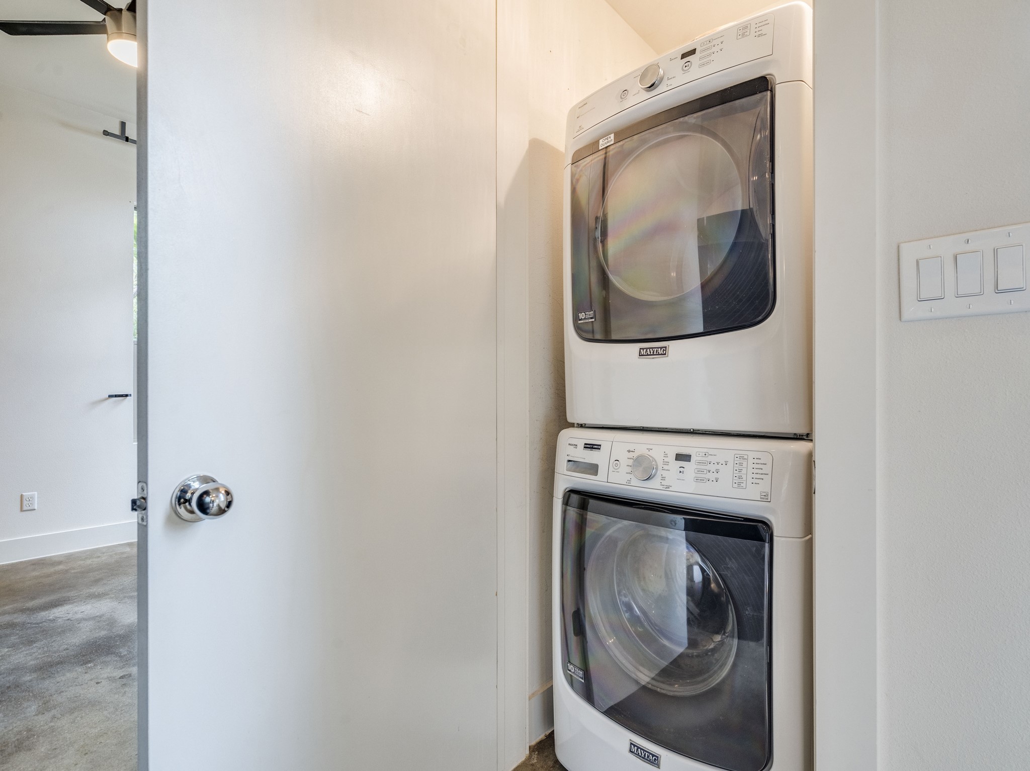 1404 Singleton Avenue, Unit B Austin, TX 78702 - Photo 18 of 21 A dedicated laundry space featuring a modern washer and dryer unit for effortless chores.