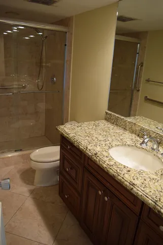 a living room with lots of furniture and gym equipment