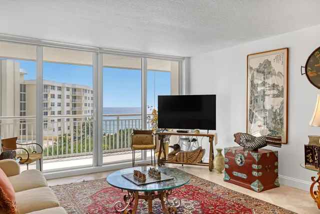 a view of a balcony with an ocean view