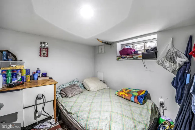 a bedroom with furniture and a couch