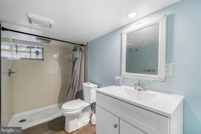 a view of a porch with furniture and garden