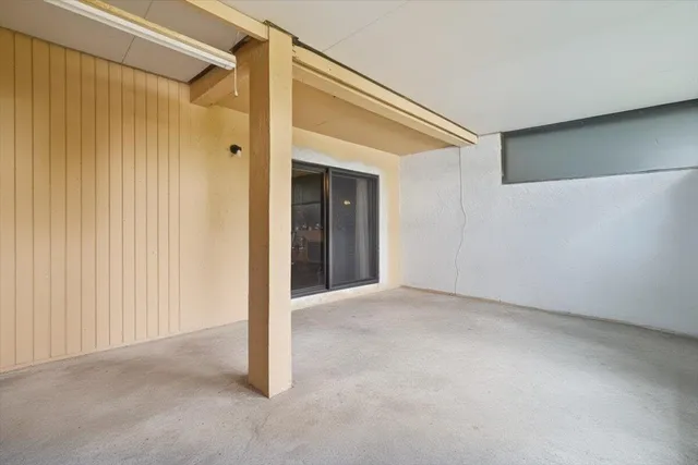 a view of a big room with wooden walls