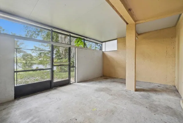 an empty room with windows