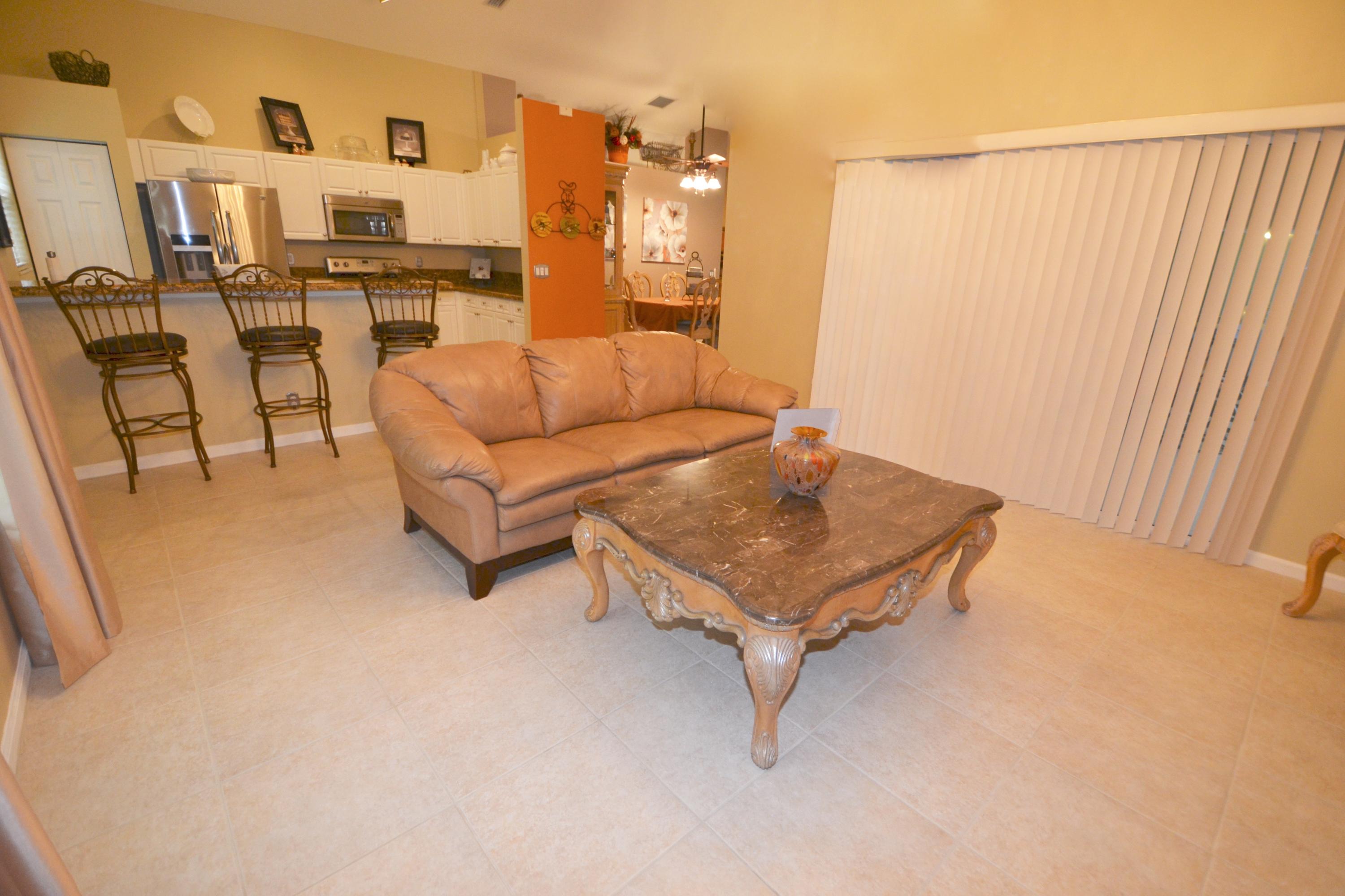 9021 Southwest Chevy Circle Stuart, FL 34997 - Photo 12 of 79 Family Rm & Kitchen = Great Room