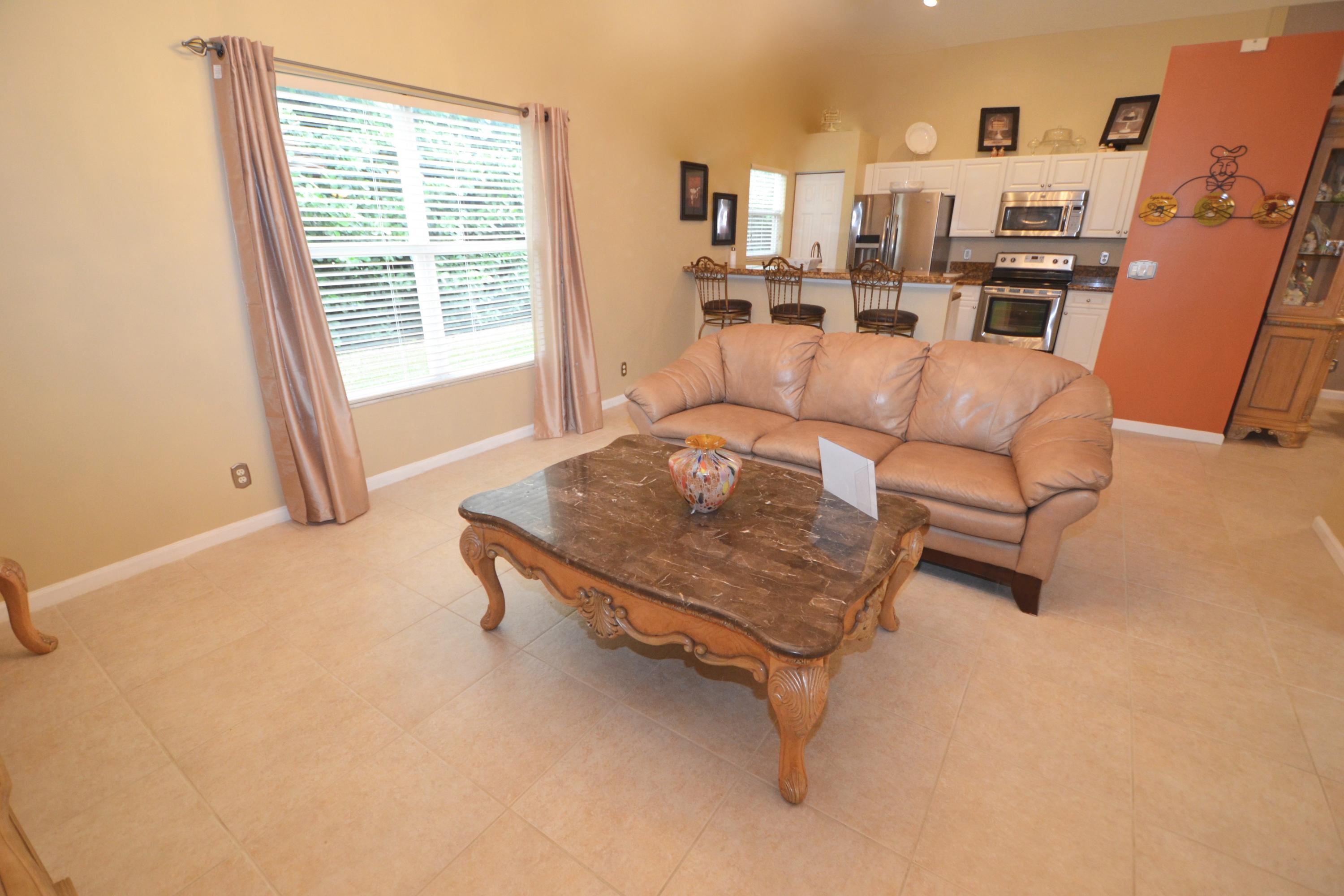 9021 Southwest Chevy Circle Stuart, FL 34997 - Photo 13 of 79 Family Rm & Kitchen = Great Room