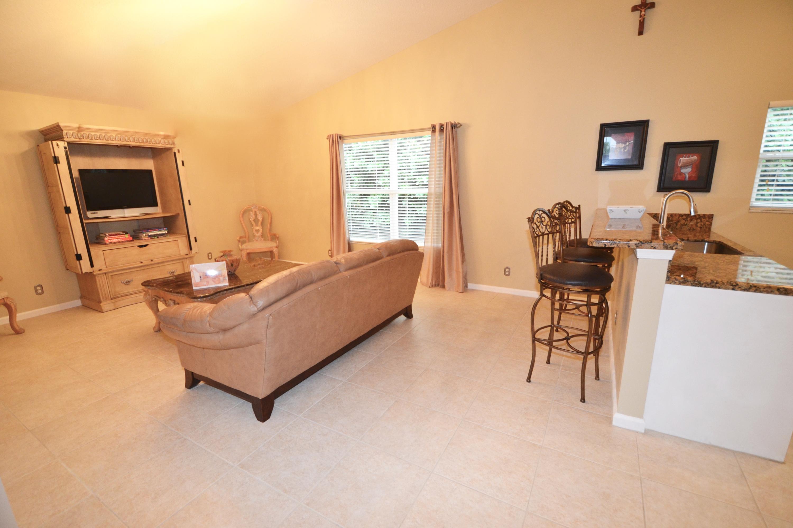 9021 Southwest Chevy Circle Stuart, FL 34997 - Photo 14 of 79 Family Rm & Kitchen = Great Room